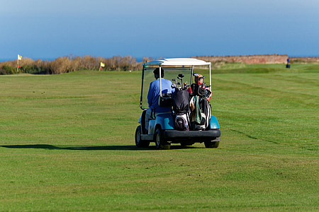 man riding golf cart thumbnail