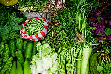 assorted green vegetables on ground thumbnail