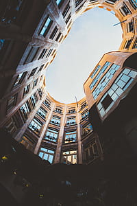 worms eyeview of brown concrete building thumbnail