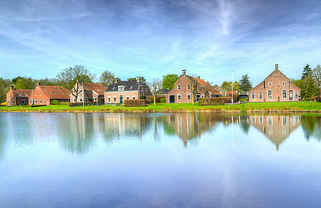 house near body of water thumbnail
