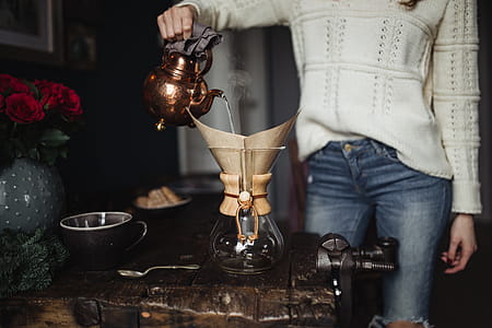 Enjoying a finely brewed coffee and playing with a dog thumbnail