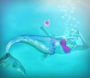 mermaid holding flower thumbnail