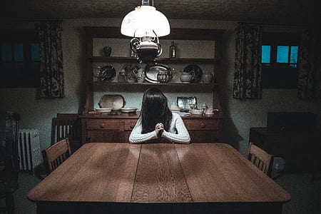 woman sitting on dining table thumbnail