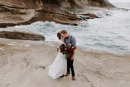 couple hugging each other in shoreline thumbnail
