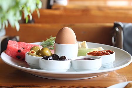round white ceramic plate with food on top thumbnail
