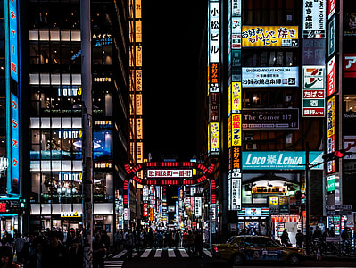 black concrete structures mounted with assorted LED signages thumbnail