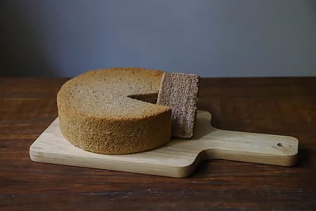Cake On Brown Wooden Chopping Board thumbnail