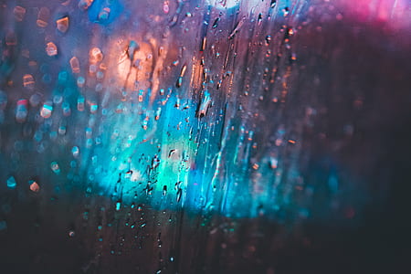 shallow focus photography of raindrops on glass thumbnail