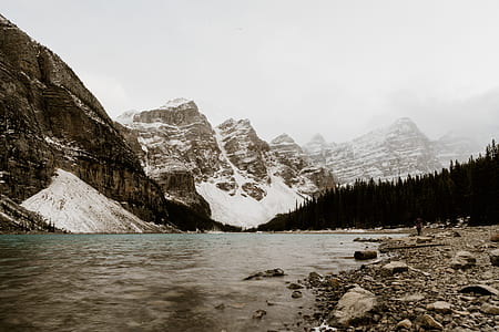 mountains and trees during daytrime thumbnail