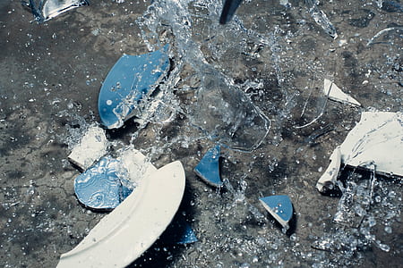 time lapse photography of broken blue and white plate thumbnail