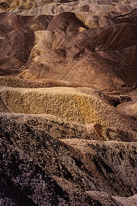 landscape photography of brown mountains thumbnail