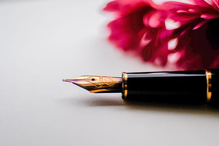 gold and black pen thumbnail