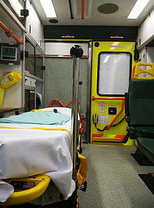 gray stainless steel bed near medical machine thumbnail