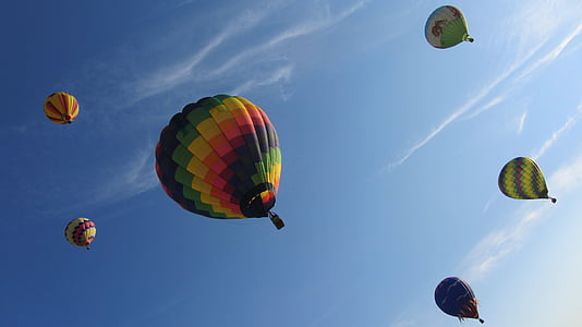 six assorted-color hot air balloons in flight thumbnail