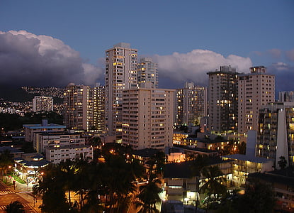 aerial view photography of lighter high rise building at nighttime thumbnail