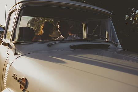 couple inside classic vehicle thumbnail