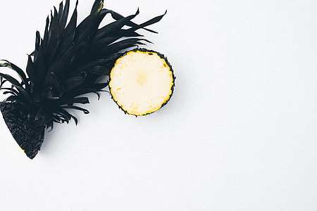 sliced pineapple on table thumbnail