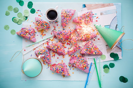 slice of cakes on teal wooden table thumbnail