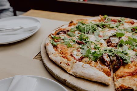 Eating delicious pizza in a cozy restaurant thumbnail