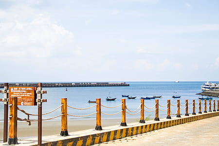 sailboats on ocean during daytime thumbnail