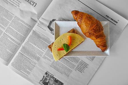 Croissant Bread and Sliced Cheese Placed on White Ceramic Saucer thumbnail
