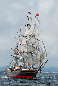 black and white ship on body of water during daytime thumbnail