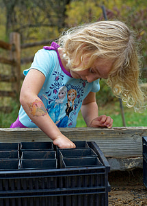 girl wearing blue Frozen themed shirt during daytime thumbnail