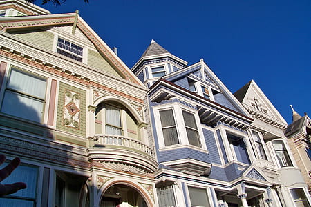 gray, blue, and white houses under blue sky thumbnail