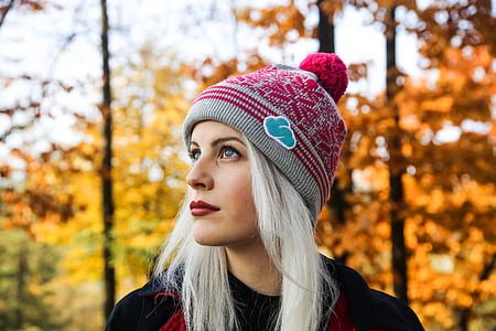 Shallow Focus of Girl Wearing Knit Surrounded by Yellow Leaved Trees thumbnail