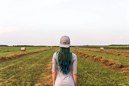 Woman Standing on Pasture thumbnail