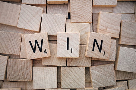 scrabble tiles forms WIN word thumbnail