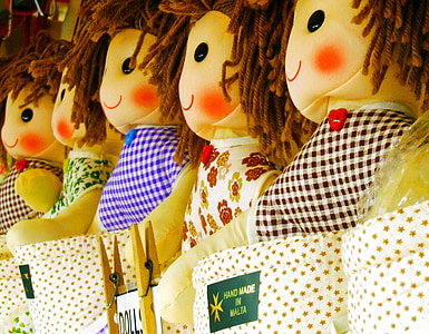 assorted-color dolls on display thumbnail