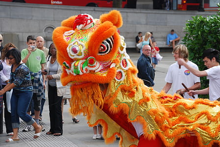 dancing dragon surrounded with people thumbnail