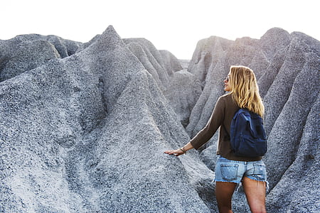 woman climbing on mountain thumbnail