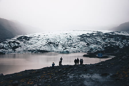people stands near lake thumbnail