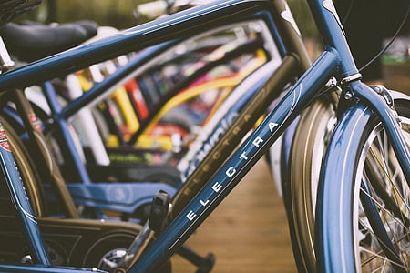 blue Electra bicycle in shallow focus shot thumbnail