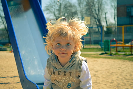 photo of child near slide thumbnail