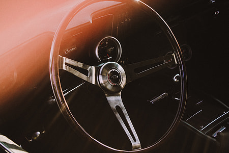 Steering wheel of old retro car thumbnail