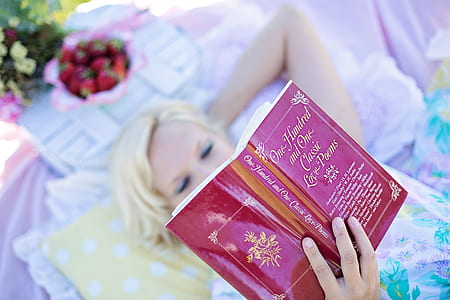 woman holding book thumbnail