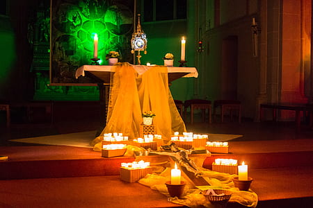altar with lighted candle infront thumbnail