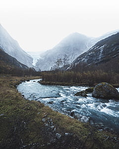 spring river between the mountain thumbnail