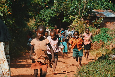 smiling children running taken during daytime thumbnail