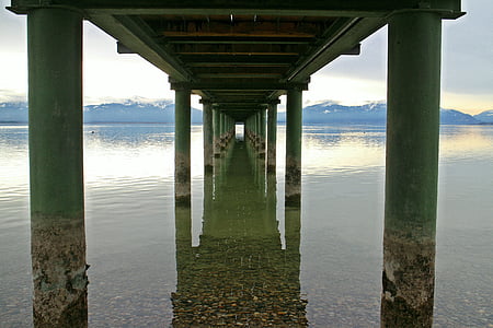underneath dock photo during golden hour thumbnail