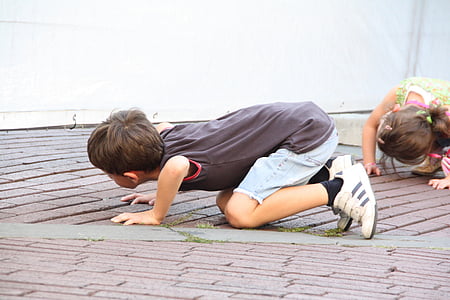 boy wearing black T-shirt and blue denim shorts thumbnail