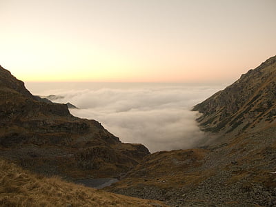 brown mountain and clouds thumbnail