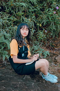 Girl in Black and Orange Shirt thumbnail