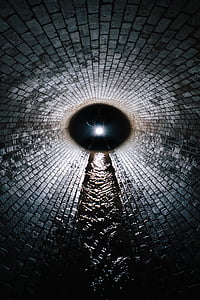 person standing inside tunnel thumbnail