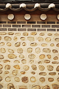 selective photography of walls covered with sones thumbnail