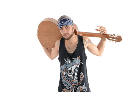 Man in Black and Grey Tank Top Carrying Brown Classical Guitar thumbnail