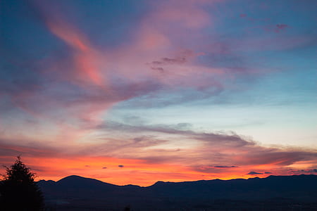 silhouette of mountains during dawn thumbnail